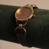 Gucci Gold Roman Dial Brown Band Quartz Watch