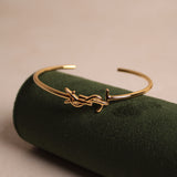 Vintage Yves Saint Laurent Golden Bangle