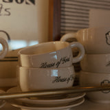 The House of Ford Ceramic Mug + Saucer